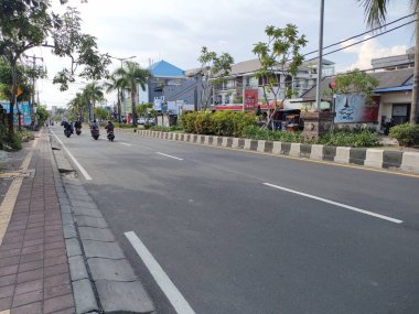 the traffic on the street was light, after last night's new years event. Bali - Indonesia ; January 1, 2023.
