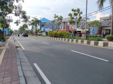 the traffic on the street was light, after last night's new years event. Bali - Indonesia ; January 1, 2023.