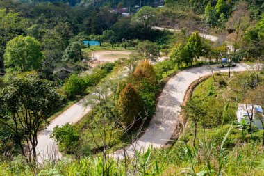 The road is winding and steep at Doi Pha Tang, Chiang Rai Province.