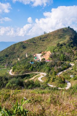 The road is winding and steep at Doi Pha Tang, Chiang Rai Province.