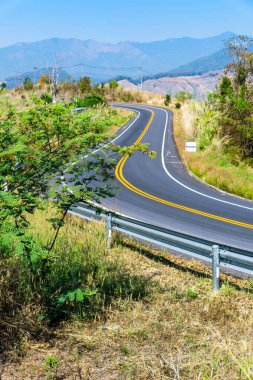 Winding and steep road in Nan province, Thailand.