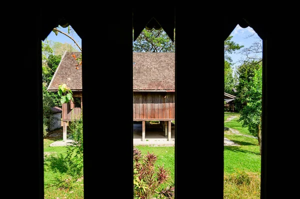 Ventilation Frame with Thai Style House Background, Chiang Mai Province.