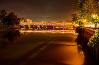 Nawarat Bridge with Ping River at Night in Chiang Mai Province, Thailand.