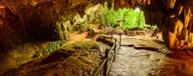 Panorama view of Thamluang cave in Thamluang Khunnam Nangnon National Park, Chiang Rai province. clipart