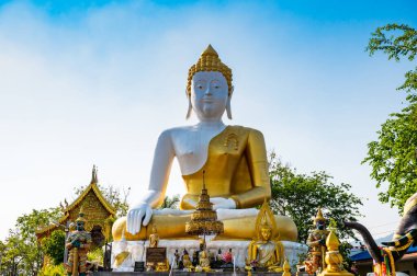 White Buddha statue of Phra That Doi Kham temple, Chiang Mai province.