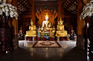 White Buddha statue in Ban Den temple, Chiang Mai province.