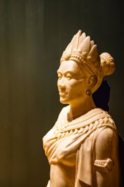 LAMPANG, THAILAND - March 8, 2020 : Fiberglass statue of Lavo people in Museum Lampang, Thailand.