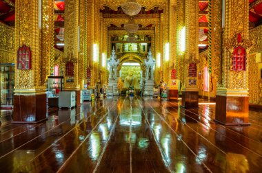 LAMPHUN, THAILAND - July 17, 2020 : Beautiful Buddha statue and beautiful church in San Pa Yang Luang temple, Lamphun province.