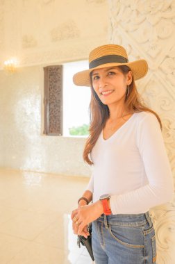 Thai woman with Thai style background, Chiang Rai province.