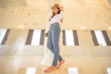 Thai woman with Thai style background, Chiang Rai province.