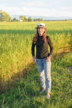 Thai Female with Rice Field Background, Phayao Province.