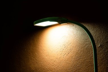 The lamp with orange wall, Thailand.