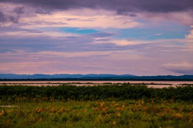 Kwan Phayao lake with rainy clouds, Thailand.