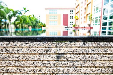 Overflowing water from swimming pool, Thailand.