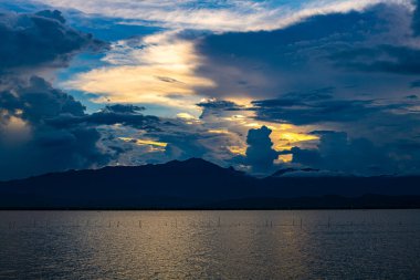 Kwan Phayao lake with rain clouds, Thailand.