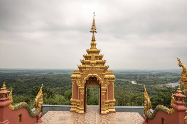 Pra That Doi Pra Chan temple with mountain view, Lampang province.