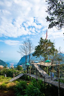 Bamboo bridge with mountain view in Pha Hi village, Chiang Rai province.