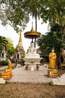 White Buddha statue of Sri Rong Muang temple in Lampang province, Thailand.