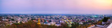 Panoramic aerial view of Nakhon Sawan cityscape at evening, Thailand.