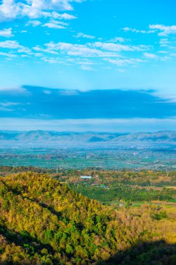 Mountain view with native village in Phrae province, Thailand.
