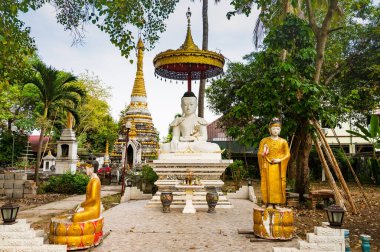 White Buddha statue of Sri Rong Muang temple in Lampang province, Thailand.