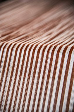 Native thread on Thai traditional weaving machine, Thailand.