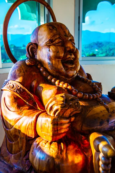 stock image Phra sangkatchai monk statue made from wood in Hyuaplakang temple, Thailand.