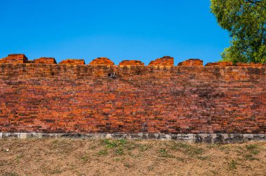 Old brick wall in Lampang province, Thailand.
