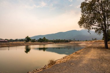 Reservoir with mountain view in Chiang Mai province, Thailand.