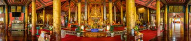 PHAYAO, THAILAND - August 13, 2020 : Pamorama of ancient Buddha statue in Wat Nantaram, Phayao province.