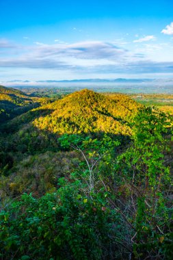 Mountain view with native village in Phrae province, Thailand.