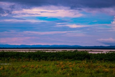 Kwan Phayao lake with rainy clouds, Thailand.