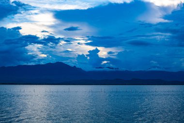 Kwan Phayao lake with rain clouds, Thailand.