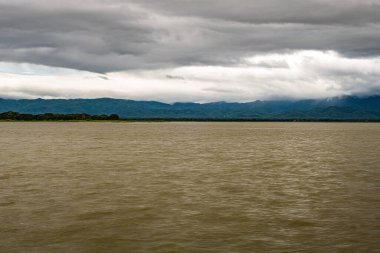 Kwan Phayao lake with rain clouds, Thailand.