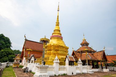 Golden pagoda in Pong Sanuk temple, Lampang province.