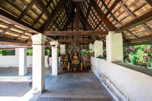 stock image Old Buddha in Intharawat temple, Chiangmai province.