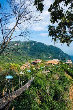 Bamboo bridge with mountain view in Pha Hi village, Chiang Rai province.