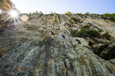 Cliff in tourist attraction of Phratupha rock painting, Lampang province.
