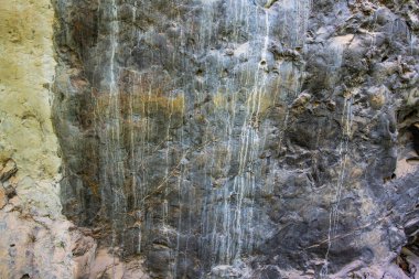 Texture of ancient rock in Phratupha rock painting, Lampang province.