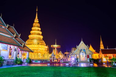 Night scene of Phra That Hariphunchai temple, Lamphun Province.