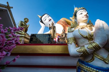 Reclining Buddha statue of Phra That Doi Kham temple, Chiang Mai province.