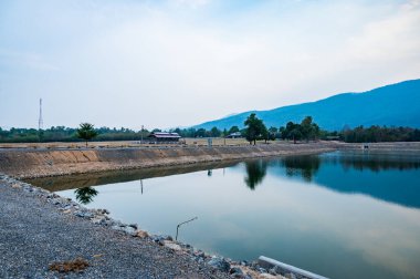 Reservoir with mountain view in Chiang Mai province, Thailand.