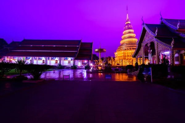 Night scene of Phra That Hariphunchai temple, Lamphun Province.