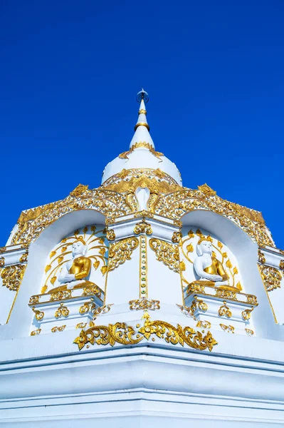 stock image White pagoda with blue sky at Tham Phra Sabai temple, Lampang province.