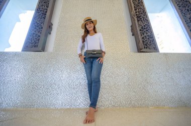 Thai woman with Thai style background, Chiang Rai province.