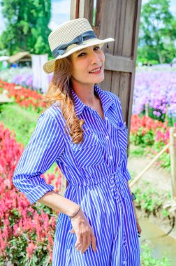 Thai Woman with Beautiful Garden at Chiang Mai Province, THailand.