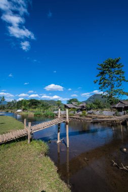 Bamboo bridge with small canal  in Mueang Khong district of Chiangmai province, Thailand.