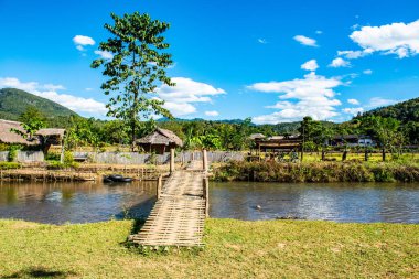 Small canal with mountain in Mueang Khong district, Thailand.