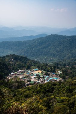 Mountain view with Doi Pui Mong hill tribe village, Thailand.