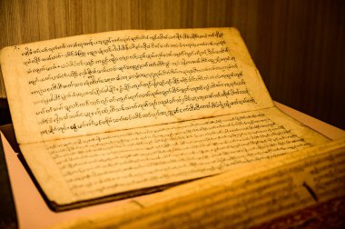 CHIANG MAI, THAILAND - February 11, 2021 : Lanna Alphabet in Ancient Book, Chiang Mai Province.